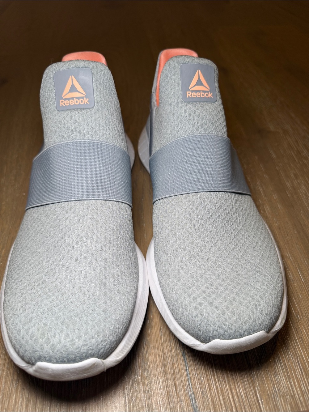 Women’s Reebok Slip-On Sneakers in Light Gray with Coral Details